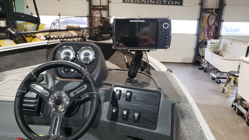 Slide: The Image of Steering console of 2025 Starcraft Stealth 166SC boat with navigation system. - 3