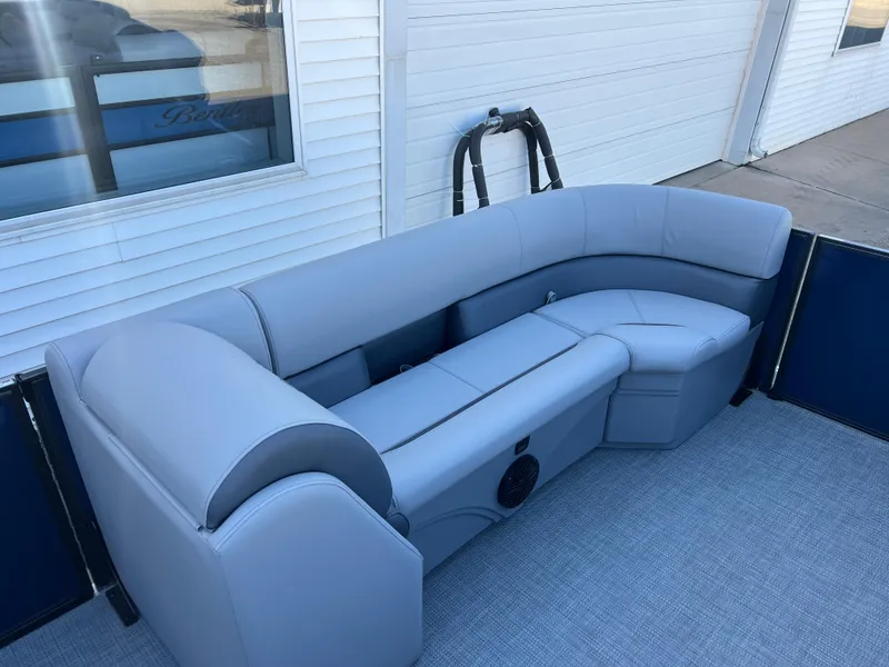 Slide: The Image of 2025 Bentley Pontoons Legacy 243 Navigator interior with gray seating and modern design. - 10