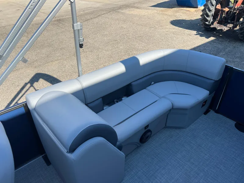 Slide: The Image of 2025 Bentley Pontoons Legacy 243 Navigator interior with gray seating and modern design. - 17