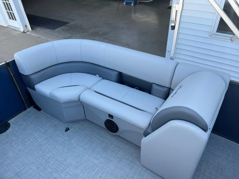 Slide: The Image of 2025 Bentley Pontoons Legacy 243 Navigator interior seating, featuring sleek gray upholstery. - 18