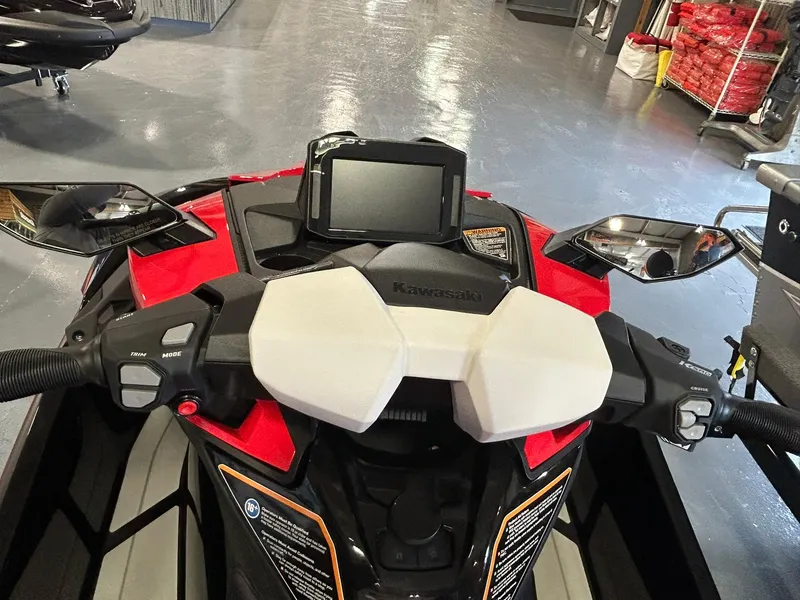 Slide: The Image of 2025 Kawasaki Jetski Ultra 310X dashboard with digital display and controls. - 3