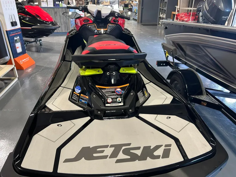 Slide: The Image of 2025 Kawasaki Jetski Ultra 310X displayed in showroom, rear view. - 5
