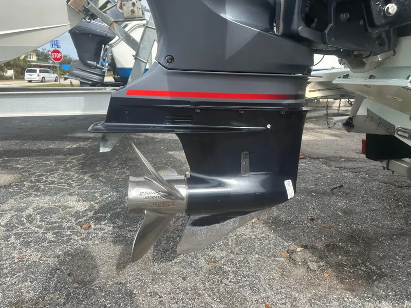 Slide: The Image of 2008 Dorado 23 Classic boat motor with stainless steel propeller on a trailer. - 11