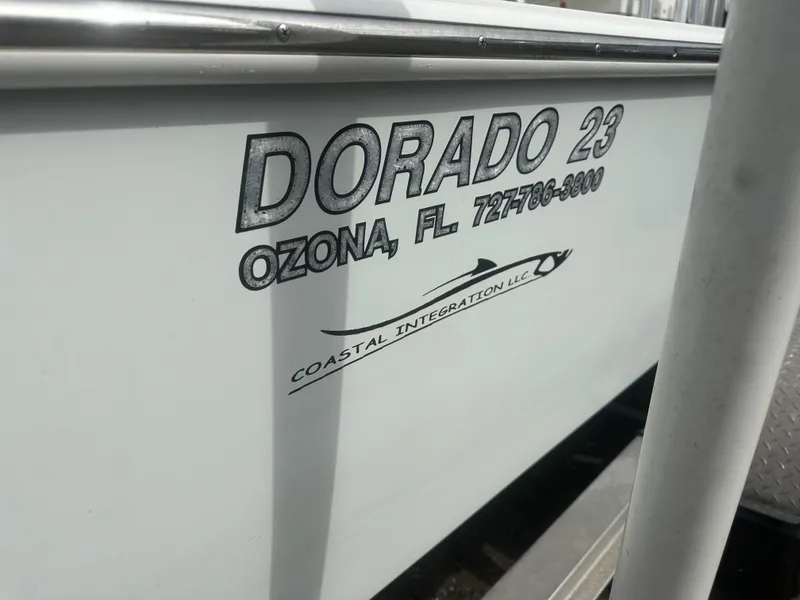 Slide: The Image of 2008 Dorado 23 Classic boat with Coastal Integration LLC branding, Ozona, FL. - 12