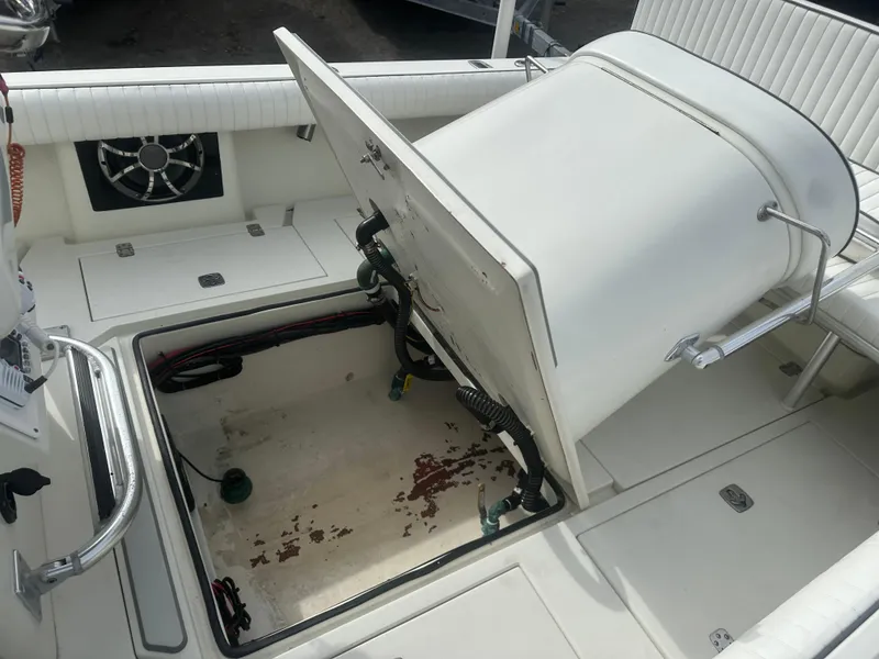 Slide: The Image of 2008 Dorado 23 Classic boat interior with open storage compartment. - 17
