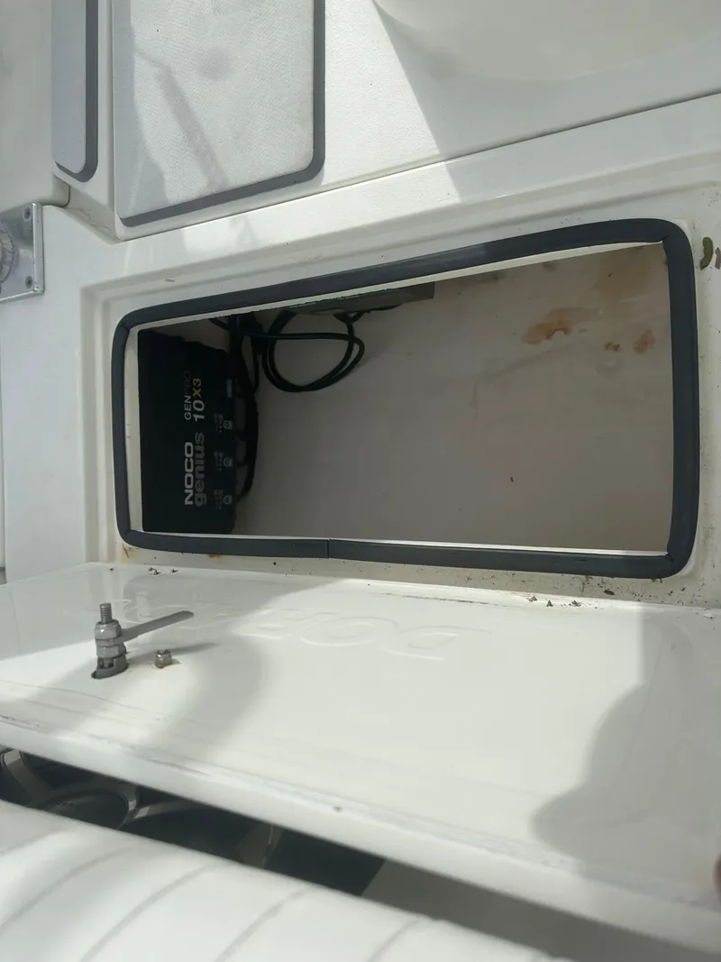 Slide: The Image of Open storage compartment on 2008 Dorado 23 Classic boat. - 33