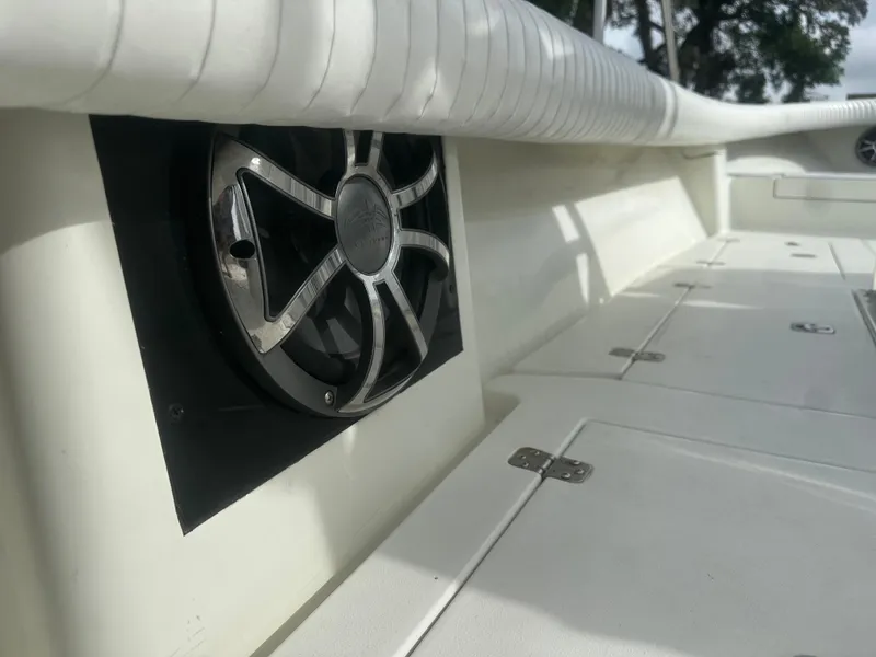 Slide: The Image of 2008 Dorado 23 Classic boat interior with speaker and storage compartments. - 34