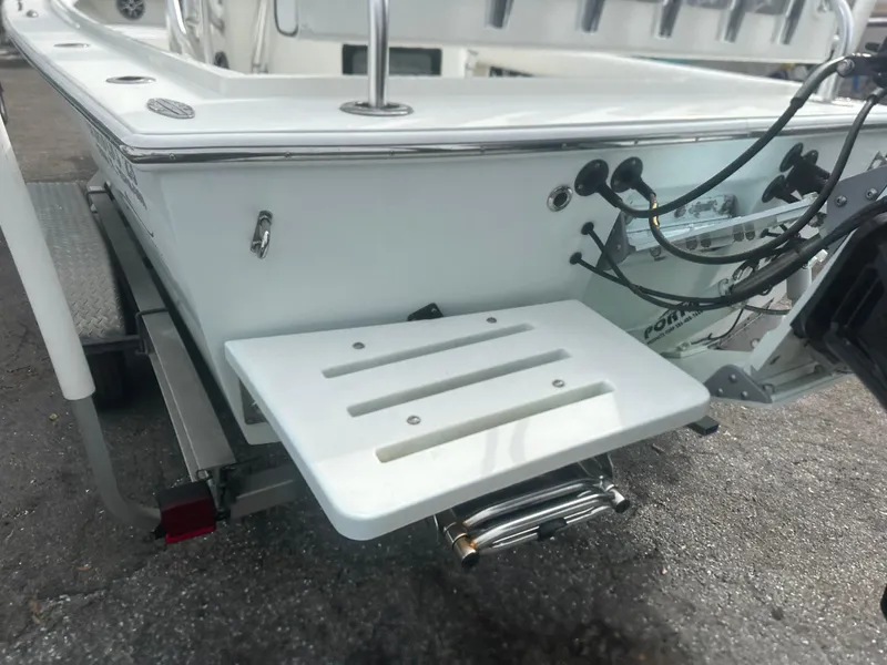 Slide: The Image of 2008 Dorado 23 Classic boat stern with swim platform and motor connections. - 6
