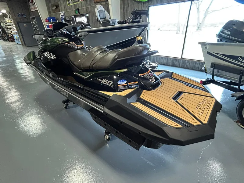 Slide: The Image of 2025 Kawasaki JET SKI ULTRA 160LX in showroom, side view. - 10
