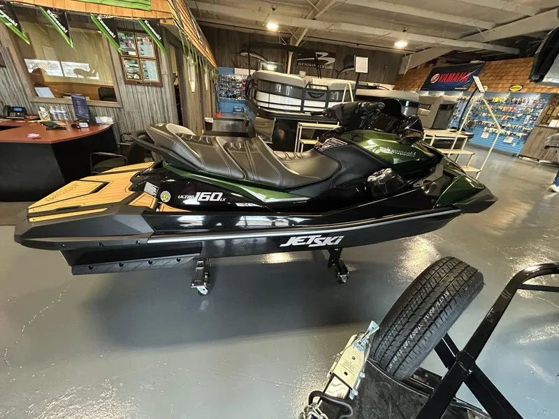 Slide: The Image of 2025 Kawasaki JET SKI ULTRA 160LX displayed in a showroom setting. - 3