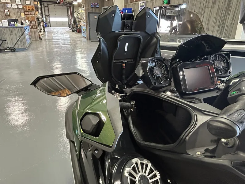 Slide: The Image of 2025 Kawasaki JET SKI ULTRA 160LX dashboard and controls in a showroom. - 6
