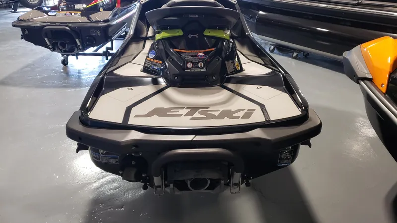 Slide: The Image of 2023 Kawasaki Jetski Ultra 310X, rear view in showroom setting. - 4