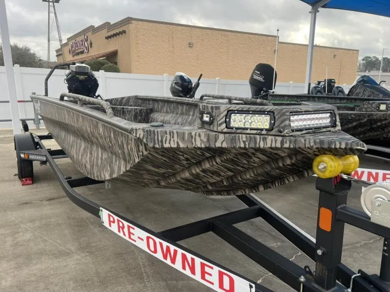 Slide: The Image of 2024 Havoc Boats 1750 MSTC Limited Edition, pre-owned, on trailer, camo design. - 1