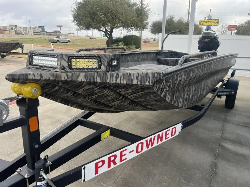 Slide: The Image of 2024 Havoc Boats 1750 MSTC Limited Edition, pre-owned, camo design, on trailer. - 2