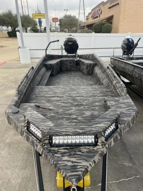 Slide: The Image of 2024 Havoc Boats 1750 MSTC LIMITED EDITION with camo design and LED lights. - 3