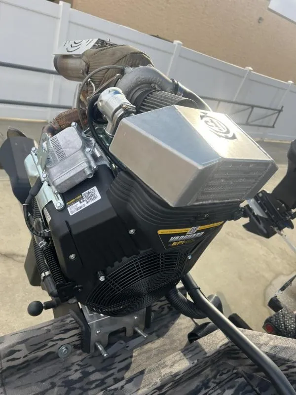 Slide: The Image of 2024 Havoc Boats 1750 MSTC LIMITED EDITION engine close-up, showcasing powerful design and components. - 9