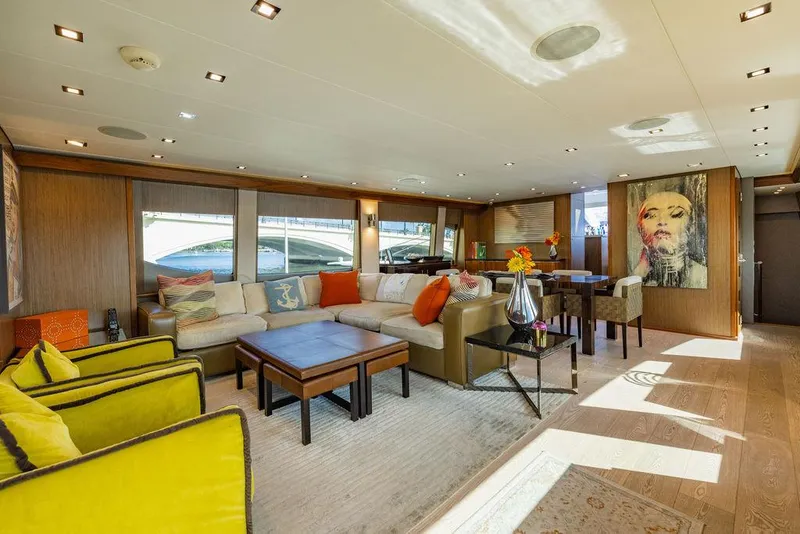 Slide: The Image of Luxurious interior of 2013 Hatteras 80 Motor Yacht with modern decor and vibrant accents. - 29