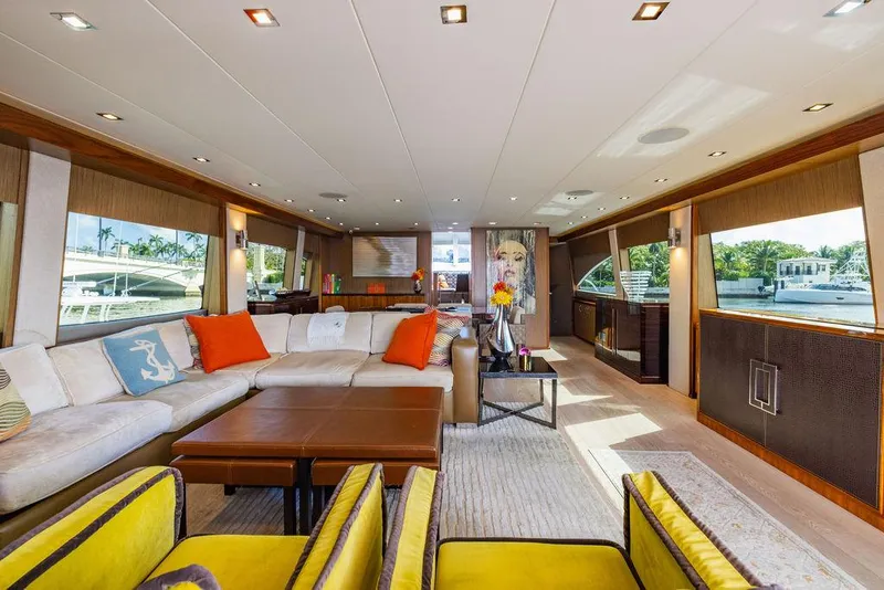 Slide: The Image of Luxurious interior of 2013 Hatteras 80 Motor Yacht with modern decor and ample seating. - 31