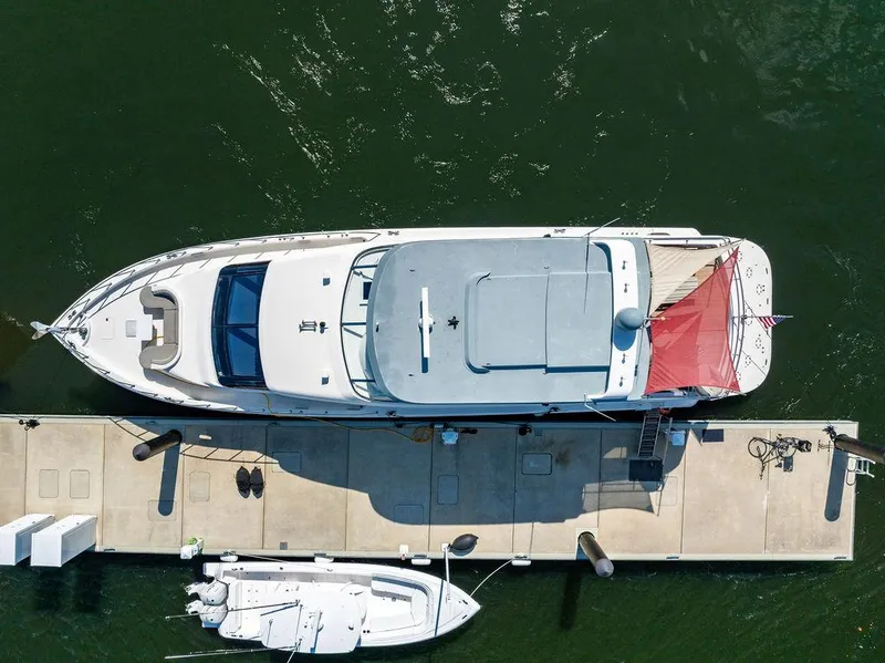 Slide: The Image of Aerial view of 2013 Hatteras 80 Motor Yacht docked at marina. - 7