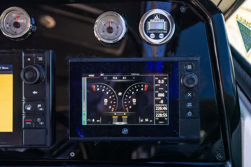 Slide: The Image of Dashboard of 2017 Formula 330 Crossover Bowrider with digital gauges and controls. - 36