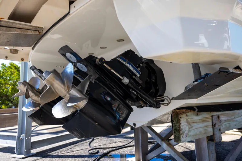 Slide: The Image of 2017 Formula 330 Crossover Bowrider boat propeller and stern drive detail. - 8