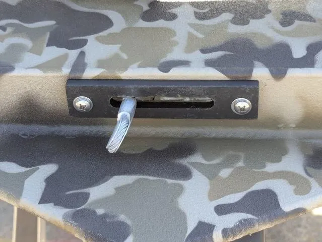 Slide: The Image of Camouflage pattern on Excel 1854 Shallow Water F4 boat, 2025 model, with a cable and mounting bracket. - 10