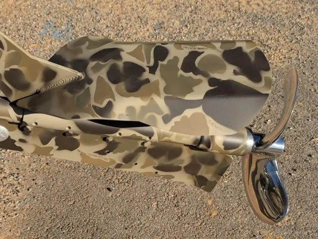 Slide: The Image of Camouflage-patterned propeller of 2025 Excel 1854 Shallow Water F4 boat on sandy ground. - 17