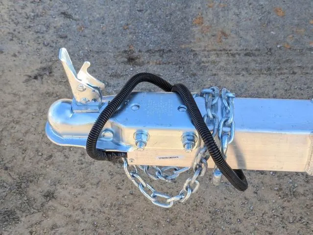 Slide: The Image of Trailer hitch with safety chain on Excel 1854 Shallow Water F4, 2025 model. - 22