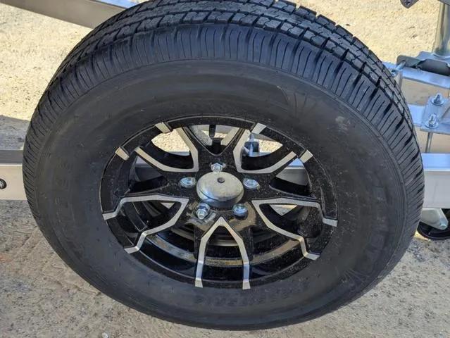 Slide: The Image of Trailer wheel of 2025 Excel 1854 Shallow Water F4, featuring black alloy rim. - 25