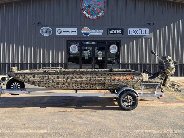 Slide: The Image of 2025 Excel 1854 Shallow Water F4 boat on trailer, camo design, parked outside dealership. - 3