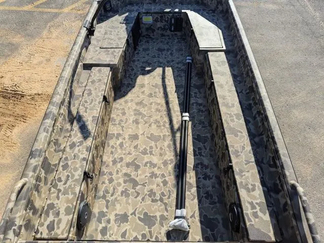 Slide: The Image of 2025 Excel 1854 Shallow Water F4 boat with camouflage interior design. - 31