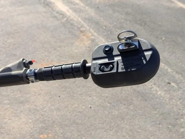 Slide: The Image of Close-up of a 2025 Excel 1854 Shallow Water F4 boat control handle. - 48