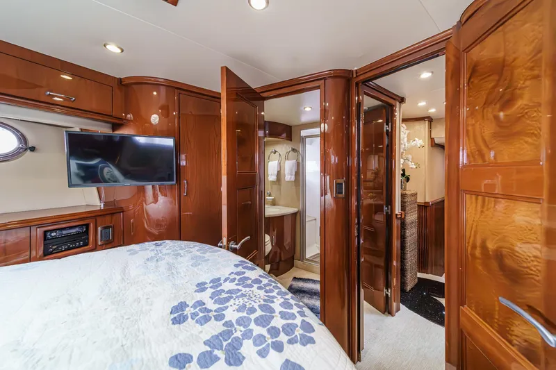 Slide: The Image of Luxurious interior of 2004 Marquis 59 yacht with wood paneling and modern amenities. - 33