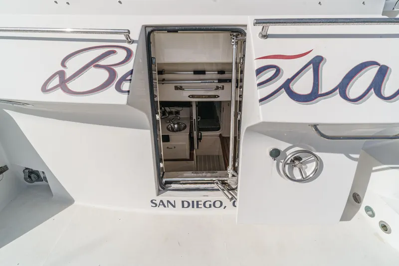 Slide: The Image of 2004 Marquis 59 yacht stern with open door, San Diego. - 47