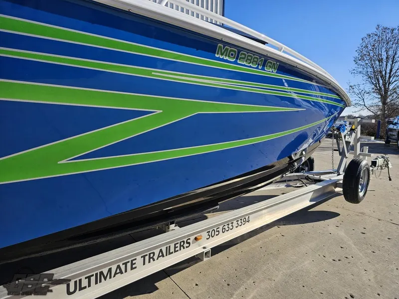 Slide: The Image of Blue and green 2014 Concept 36' CC boat on trailer, side view. - 17