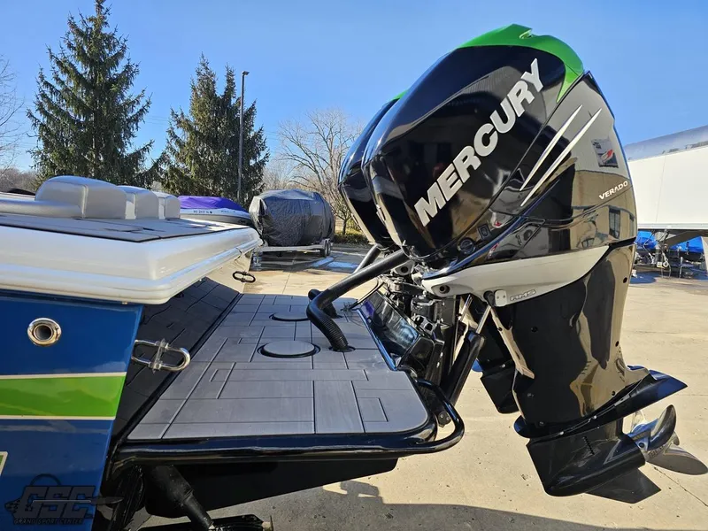 Slide: The Image of 2014 Concept 36' CC boat with Mercury outboard engine, docked outdoors. - 39