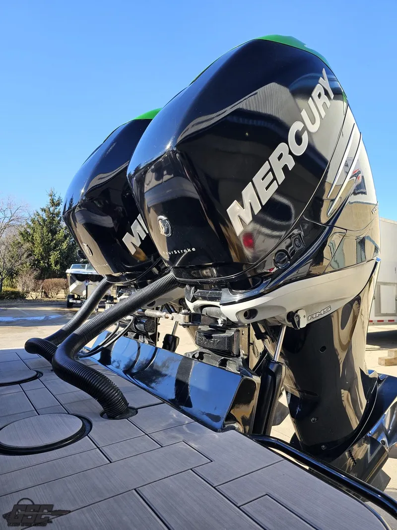 Slide: The Image of Twin Mercury outboard engines on a 2014 Concept 36' CC boat. - 40