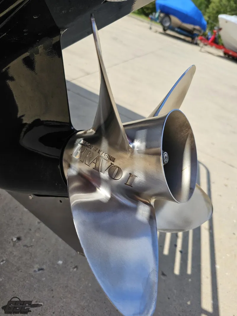 Slide: The Image of Close-up of a 2007 Baja 26 Outlaw boat propeller, shiny metal finish. - 34