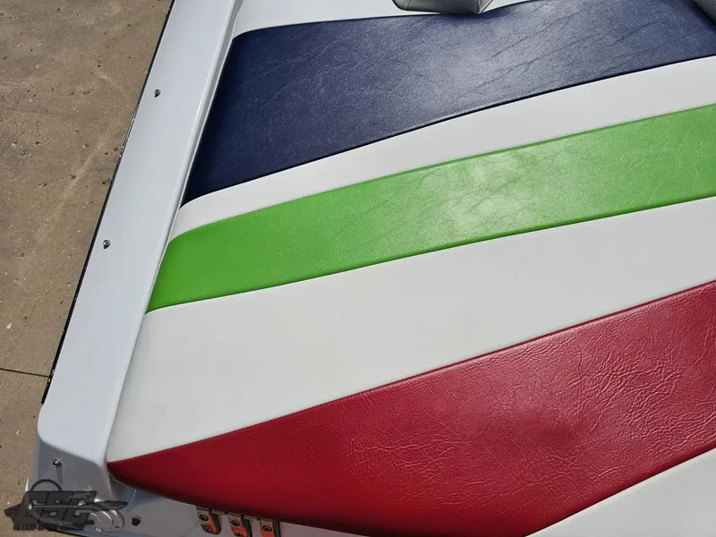 Slide: The Image of Colorful seat upholstery on a 2007 Baja 26 Outlaw boat. - 41
