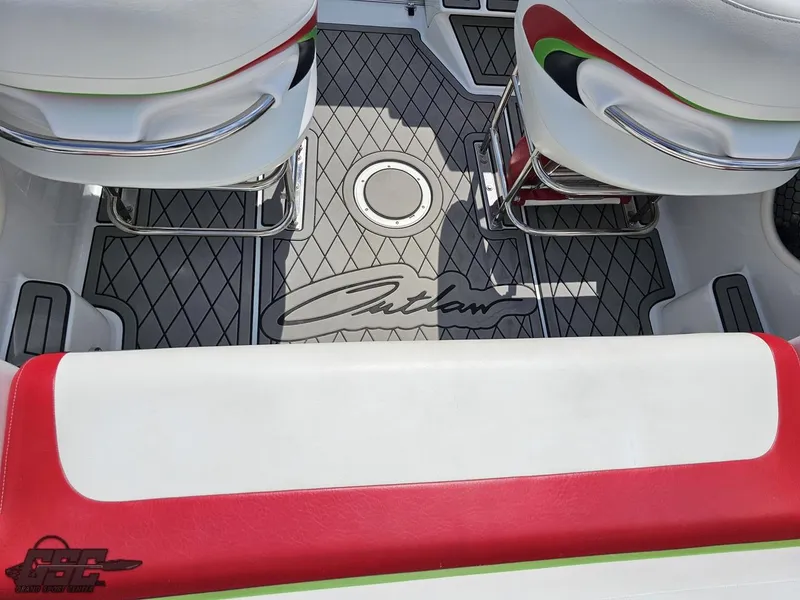 Slide: The Image of 2007 Baja 26 Outlaw boat interior with custom seating and flooring design. - 47