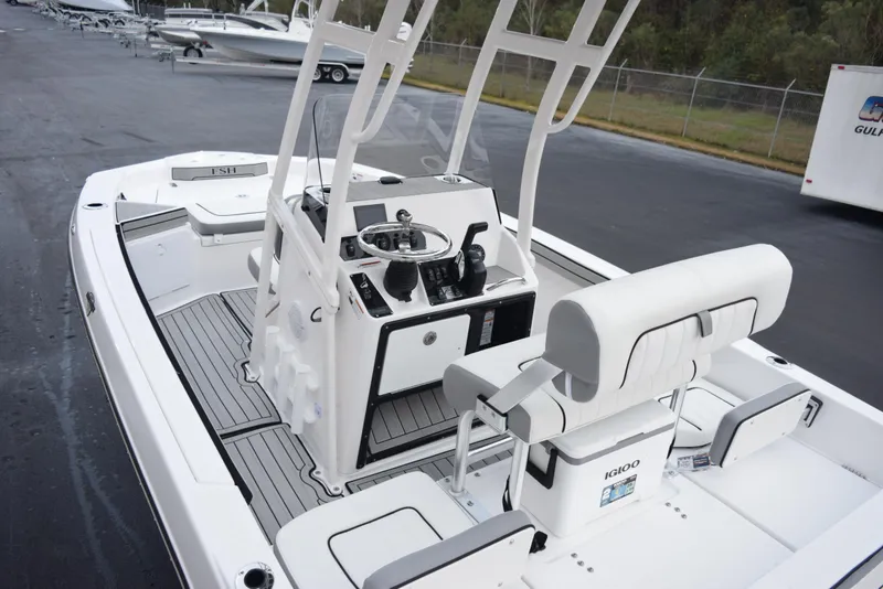 Slide: The Image of 2025 Yamaha Boats 195 FSH Sport interior, featuring sleek design and modern controls. - 7