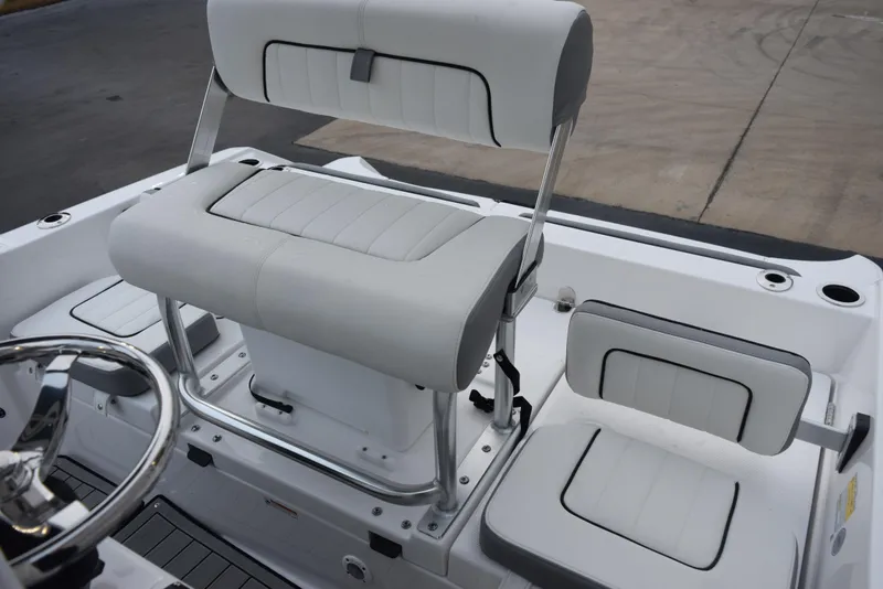 Slide: The Image of 2025 Yamaha Boats 195 FSH Sport interior seating and helm detail. - 9