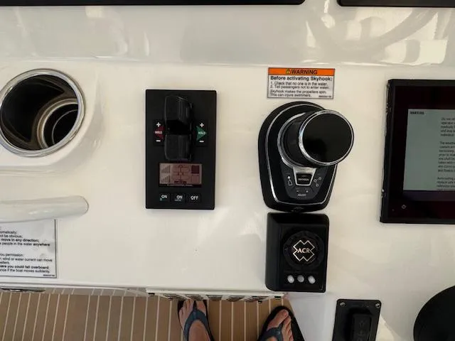 Slide: The Image of Control panel of a 2016 Intrepid 475 Panacea boat with navigation equipment. - 25