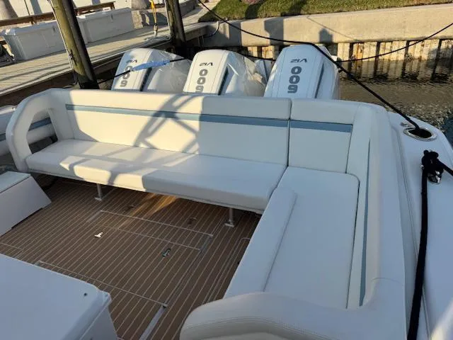 Slide: The Image of 2016 Intrepid 475 Panacea boat with spacious seating and powerful engines. - 31