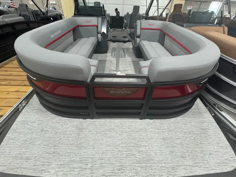 Slide: The Image of 2025 Bennington 24MFB-SPS pontoon boat with spacious seating and modern design. - 4