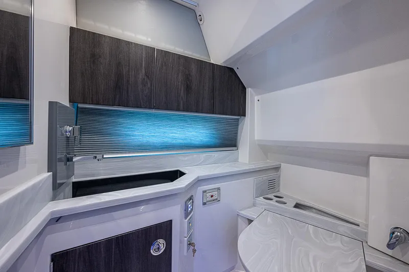 Slide: The Image of 2022 Formula 430 All Sport Crossover bathroom with modern design and sleek cabinetry. - 13