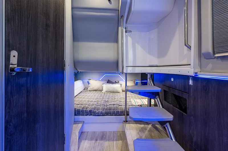 Slide: The Image of Interior of 2022 Formula 430 All Sport Crossover, featuring modern sleeping area and sleek design. - 15