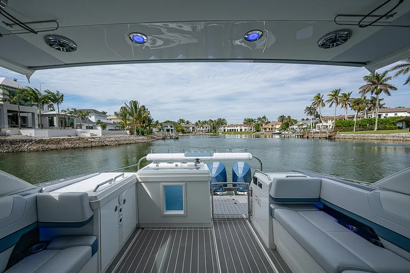 Slide: The Image of 2022 Formula 430 All Sport Crossover boat interior with waterfront view. - 18