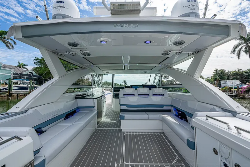 Slide: The Image of 2022 Formula 430 All Sport Crossover luxury boat interior with spacious seating and modern design. - 27