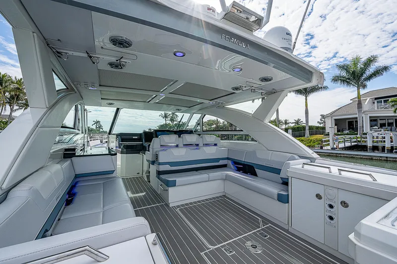 Slide: The Image of 2022 Formula 430 All Sport Crossover boat interior with spacious seating and modern design. - 28